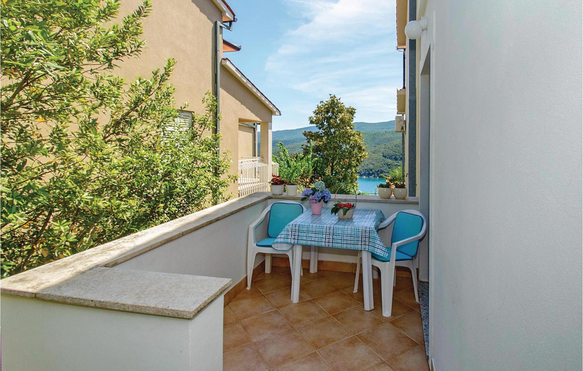 Beautiful Apartment In Rabac With Kitchen Exterior foto
