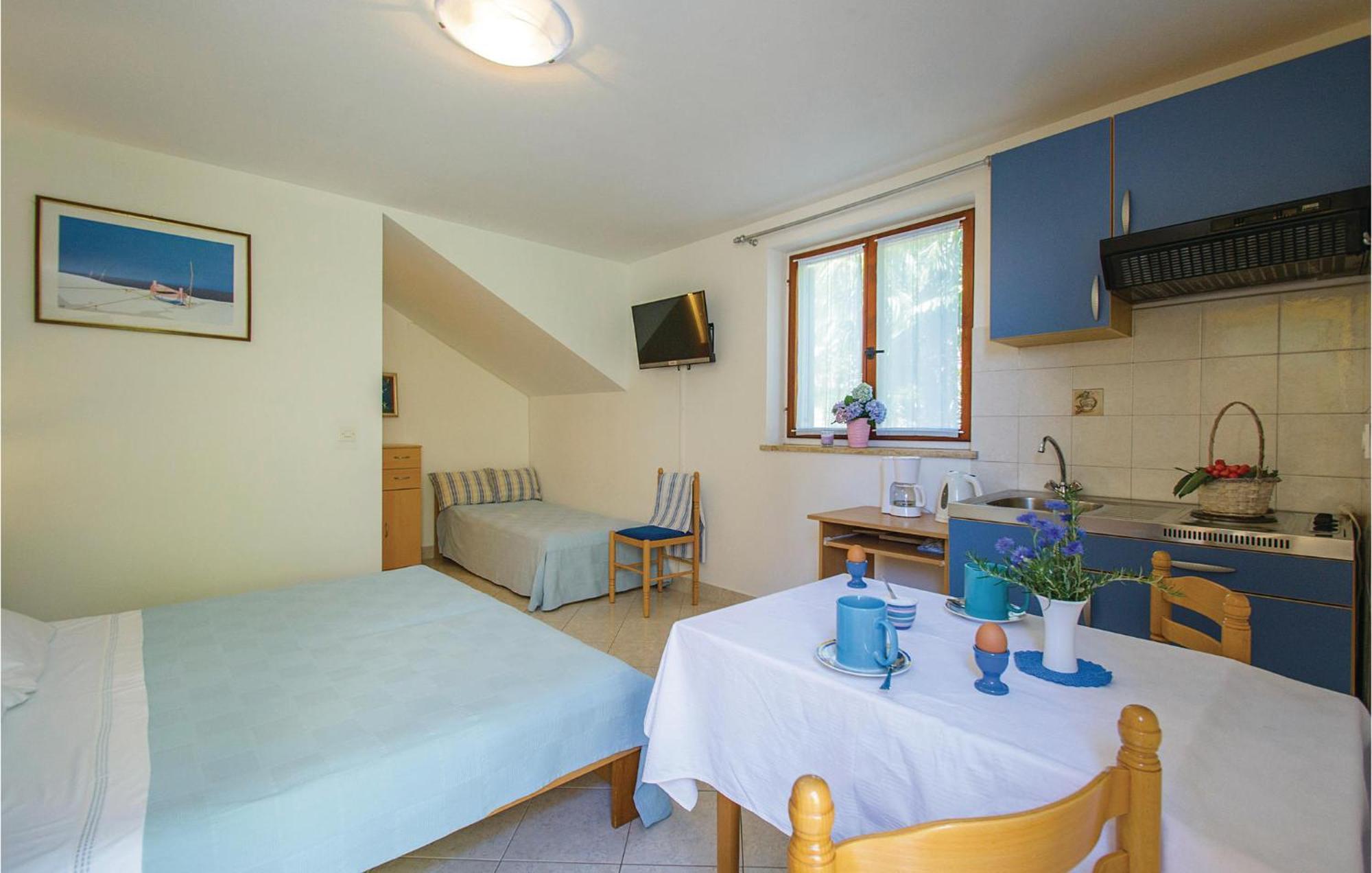 Beautiful Apartment In Rabac With Kitchen Exterior foto