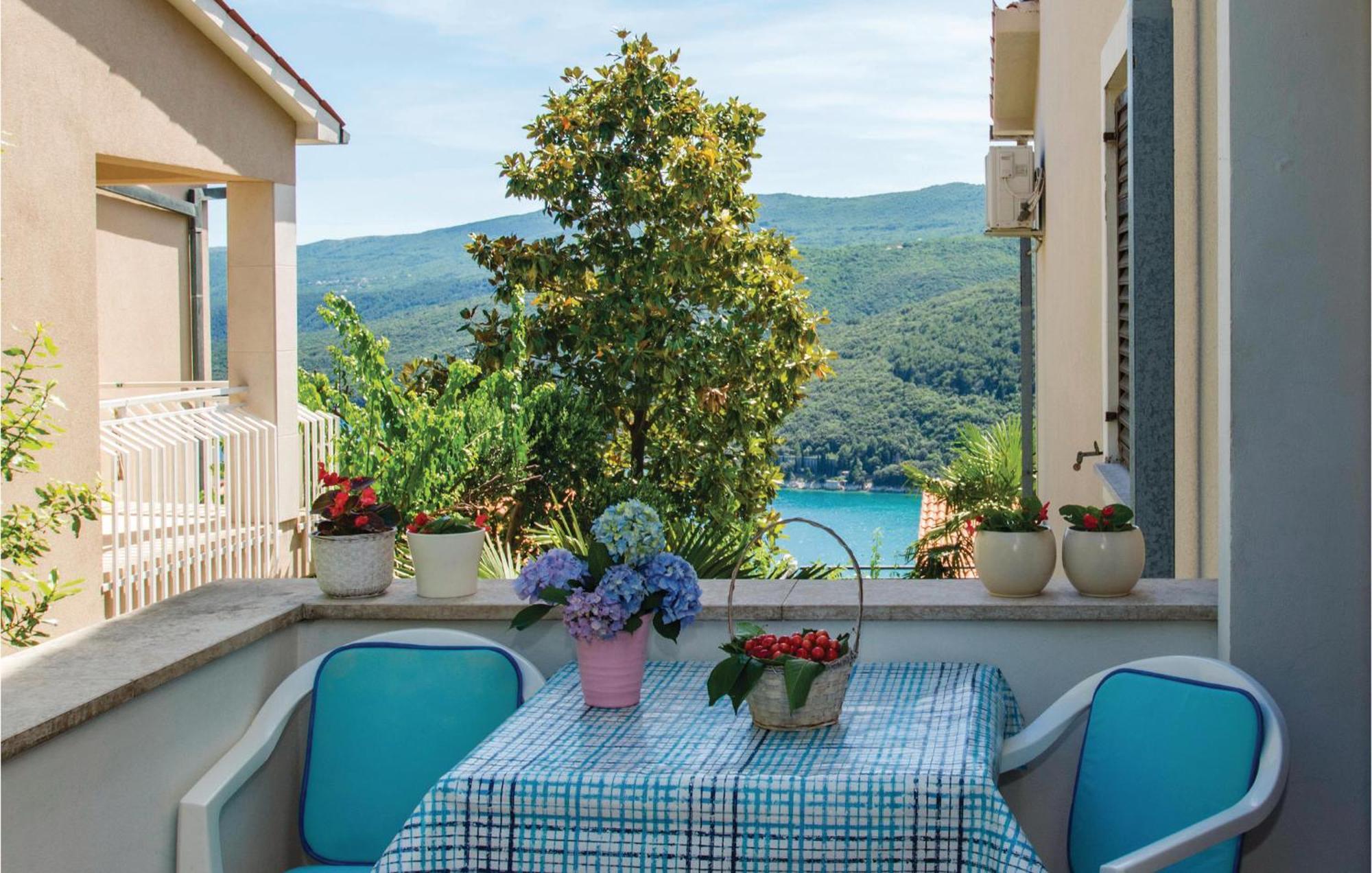 Beautiful Apartment In Rabac With Kitchen Exterior foto